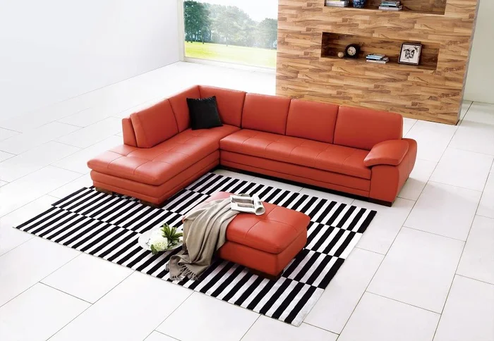 J&M Furniture – 625 Italian Leather Ottoman and Left Hand Facing Sectional in Pumpkin